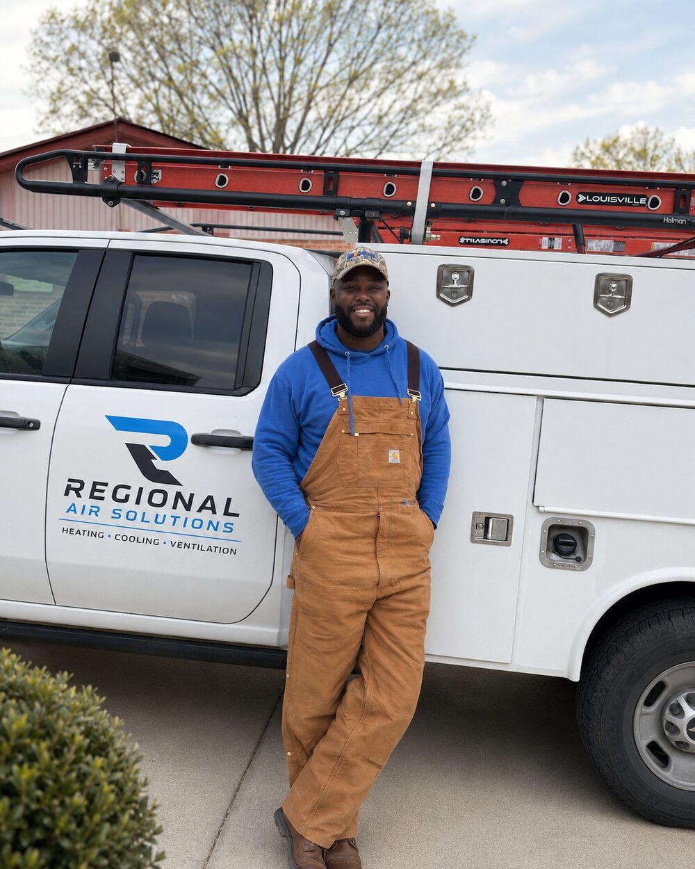Carl Offord, licensed HVAC contractor, beside the Regional Air Solutions service truck in Greensboro, NC